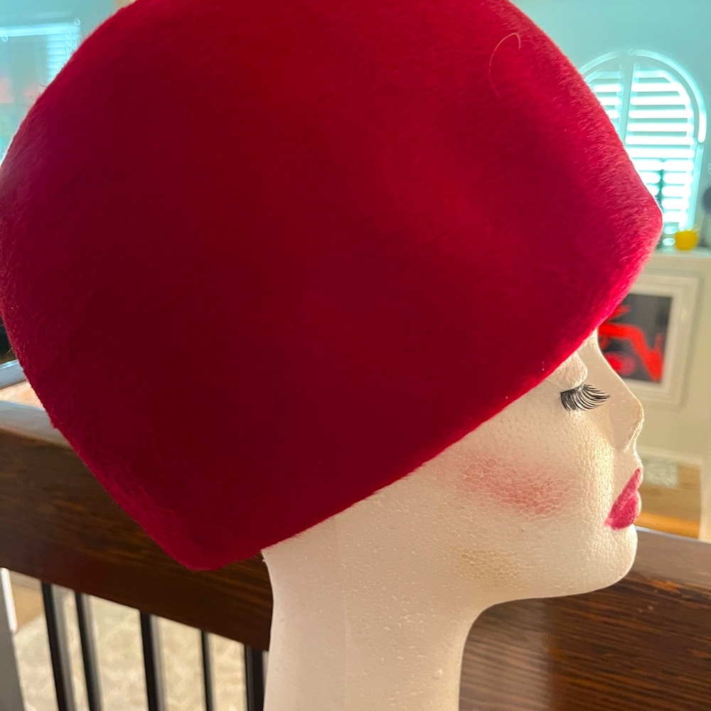 This is a  red beehive wool hat  from the 60s.